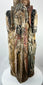 Spanish Colonial religious wood carving with four haloed saints in arched niches.