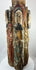 Antique Spanish Colonial devotional sculpture with four carved saints arranged around a column.