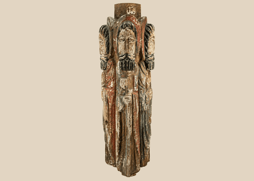 Spanish Colonial carved wooden column with four haloed saint figures and traces of polychrome paint.