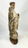 Colonial era carved wooden santo representing a Catholic friar, likely Franciscan or Dominican, with aged devotional wear.