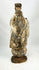 Hand-carved Spanish Colonial santo figure with tonsured hair and simple robed attire, dating to the 17th–18th century.