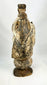 Hand-carved Spanish Colonial santo figure with tonsured hair and simple robed attire, dating to the 17th–18th century.