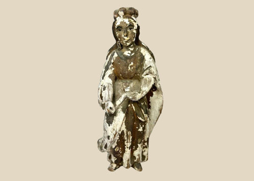 Antique Spanish Colonial Santo statue, hand-carved from wood with remnants of polychrome paint, depicting a robed religious figure with folded hands, traditional hairstyle, and worn surface patina, dating to the 18th–19th century, used for devotional practices in colonial-era Catholic households.