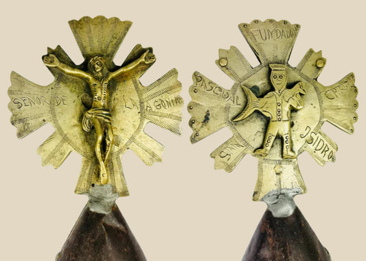 Double-sided Spanish Colonial processional cross finial in cast and engraved brass with iron shaft, featuring Christ on the cross with sunburst rays on one side and a saint holding a fish on the reverse, Latin America (Peru or Bolivia), 18th–19th century