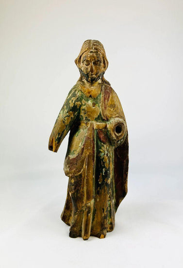 17th–18th century Spanish Colonial wooden statue of a saint or religious figure, hand-carved with flowing drapery and expressive face. Remnants of polychrome paint, surface wear, and a missing arm reflect centuries of devotional use in churches, chapels, or private altars, showcasing Colonial religious artistry.