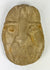 Protective guardian stone head sculpture with weathered surface