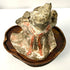 Rear view of Tang Dynasty terracotta court musician statue hairstyle