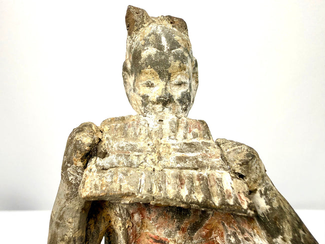Close-up detail of terracotta court musician head and pan flute