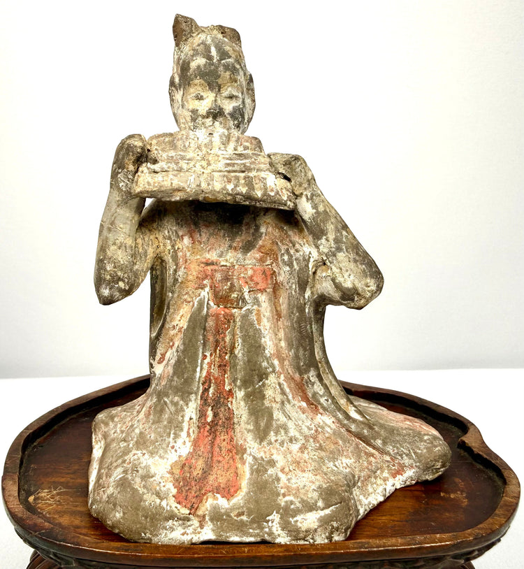 Frontal Tang Dynasty terracotta female musician figure with faded paint