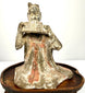 Frontal Tang Dynasty terracotta female musician figure with faded paint