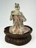 Tang Dynasty terracotta figure of female musician with red and white pigment traces