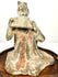 Ancient Chinese terracotta figurine seated woman playing pan flute detail