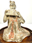 Ancient Chinese terracotta figurine seated woman playing pan flute detail