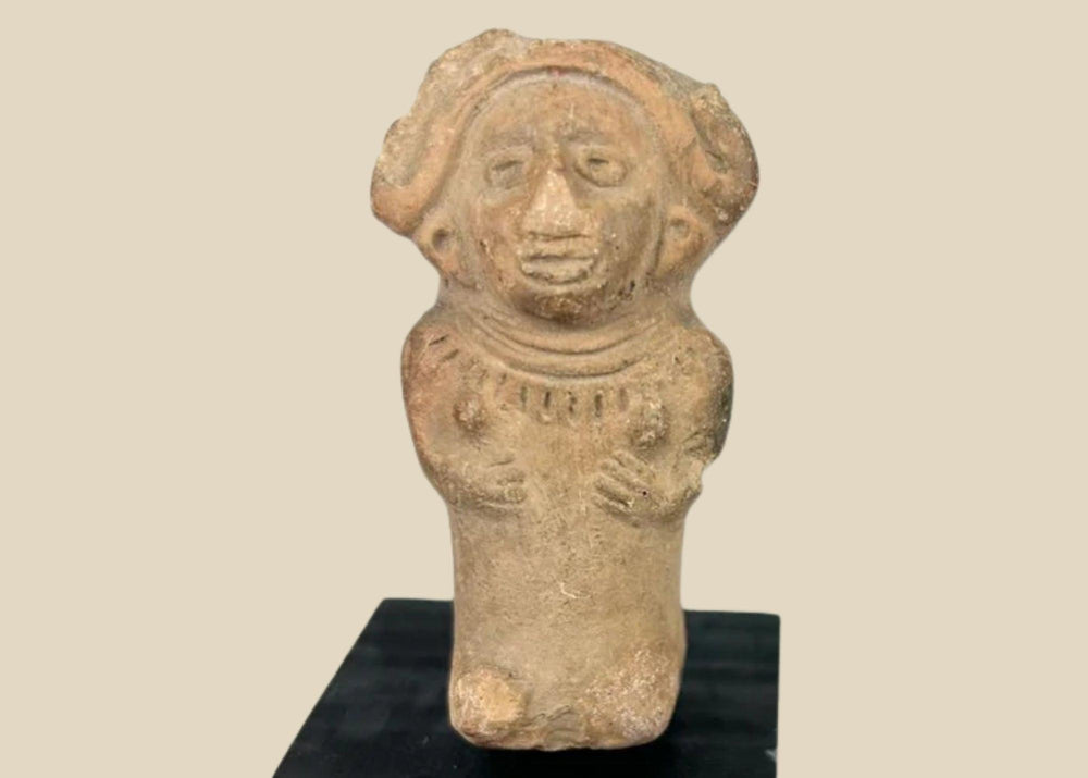 Ancient Veracruz terracotta figurine of a seated female with flaring headdress, almond-shaped eyes, and necklace, circa 600–900 CE, Late Classic period, mounted on black display base.