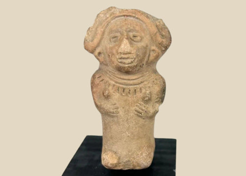 Ancient Veracruz terracotta figurine of a seated female with flaring headdress, almond-shaped eyes, and necklace, circa 600–900 CE, Late Classic period, mounted on black display base.