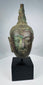 Sukhothai Period Buddha head with downcast eyes and elongated earlobes