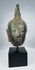 Antique Thai bronze head of Buddha Shakyamuni with natural green patina