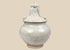 Antique Thai Sawankhalok covered stoneware jar with pale crackled glaze and sculptural architectural lid, 15th–16th century.
