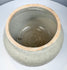 Antique Si Satchanalai stoneware vessel with sculptural fitted cover, applied scroll decoration, and crackled glaze.