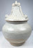 15th–16th century Thai covered ceramic jar with globular body, fitted sculptural lid, and historic firing traces.