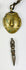 Six Tibetan bronze amulets including religious and symbolic figures
