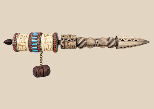 Antique Tibetan Buddhist prayer wheel with carved wooden handle, cream-colored panels and turquoise and coral-colored decoration, circa 1900–1930