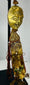Tibetan ritual pendant with gilt bronze mask and aged textiles
