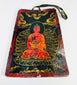 Hand-painted Tibetan devotional plaque on bone depicting the Buddha seated on a lotus throne