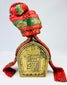 19th–20th century Tibetan gau amulet box with sacred inscriptions and woven red-green fabric case