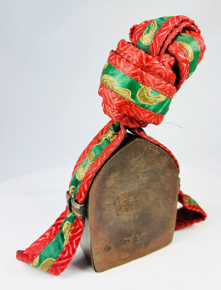 19th century Tibetan gau box with repoussé metalwork and embroidered protective pouch