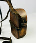 Rear view of Tibetan Gau box showing removable back panel and aged patina.