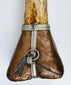Carved dragon detail on Tibetan Buddhist kangling ritual trumpet made from human femur bone