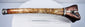 Tibetan Buddhist human bone kangling ceremonial trumpet with intricate dragon carving, late 19th to early 20th century