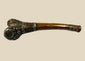 Full-length side view of Tibetan kangling ritual trumpet fashioned from a human femur with ornate metal fittings