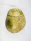 Top view of Tibetan Kapala ritual skull cup showing cranial sutures and natural bone patina, 19th century Buddhist ceremonial vessel.