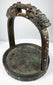 18th–19th century Mongolian or Tibetan bronze stirrup with dragon-head terminals, turquoise, coral, and glass inlays.
