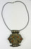 Tibetan-Nepalese gau amulet pendant with coral, turquoise, and hollow reliquary cavity