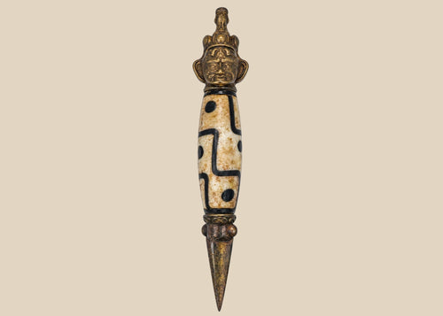 Tibetan Dzi-style bead phurba amulet with copper-alloy fittings and trihedral blade