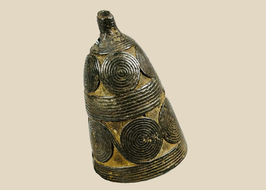 Late 19th–early 20th century Tibetan Buddhist bronze ritual bell (ghanta) with lotus petal base, vajra-finial handle, original iron clapper, dark patina from ritual use, used in Vajrayana ceremonies