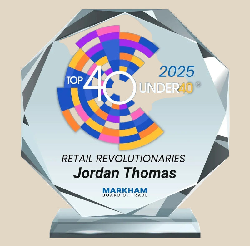 Crystal award for the 2025 “Top 40 Under 40” Retail Revolutionaries, presented to Jordan Thomas by the Markham Board of Trade.