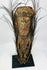 Antique Papua New Guinea carved ancestor figure with cowrie shell inlay and ritual patina