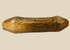 Full side view of hand-carved Melanesian wooden fish drum showing detailed incised patterns
