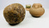 Ancient East Asian green-glazed ritual cup on stand, aged glaze with chipping and devotional wear.
