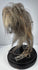 Vintage Amazonian-inspired tsantsa replica featuring closed stitched features, aged hide texture, and preserved horse hair.
