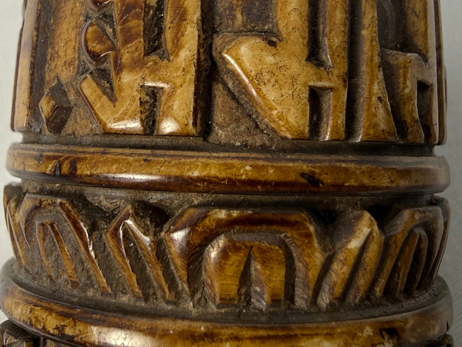 Antique Tibetan ritual object carved from human bone with Buddhist figures and sacred inscriptions