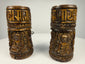 Antique Tibetan human bone prayer wheels with carved Buddha figures and Sanskrit inscriptions