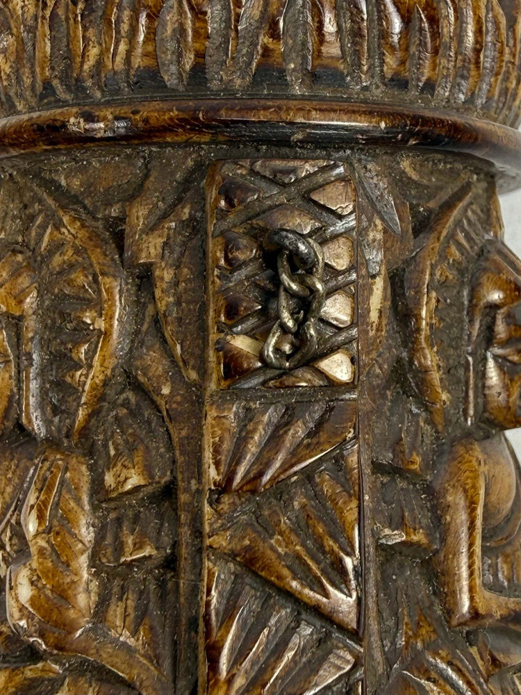 Tibetan Buddhist human bone prayer wheel with three Buddha figures in distinct mudra positions