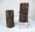 Pair of Tibetan Buddhist prayer wheels hand-carved from human femur bone, dating to the 18th–19th century and decorated with sacred relief imagery.