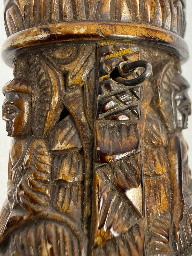Antique Tibetan human bone prayer wheels with carved Buddha figures and Sanskrit inscriptions