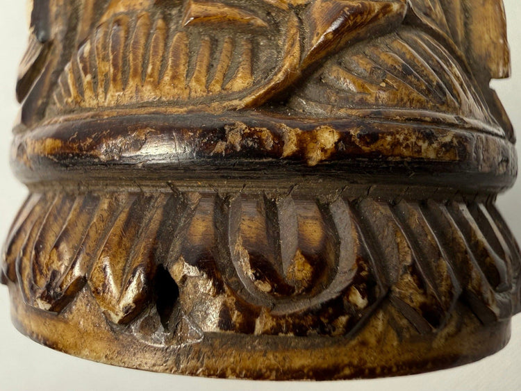 Pair of Tibetan Buddhist prayer wheels carved from human femur bone with Buddha relief figures